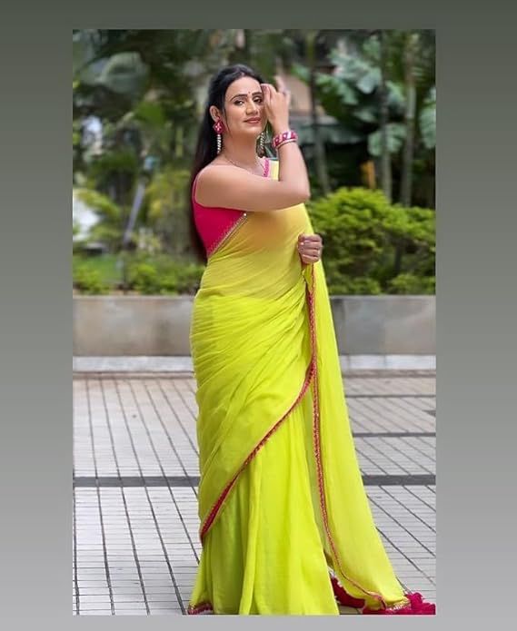 Green Georgette Saree with blouse and beautiful embroidery lace border with latkan